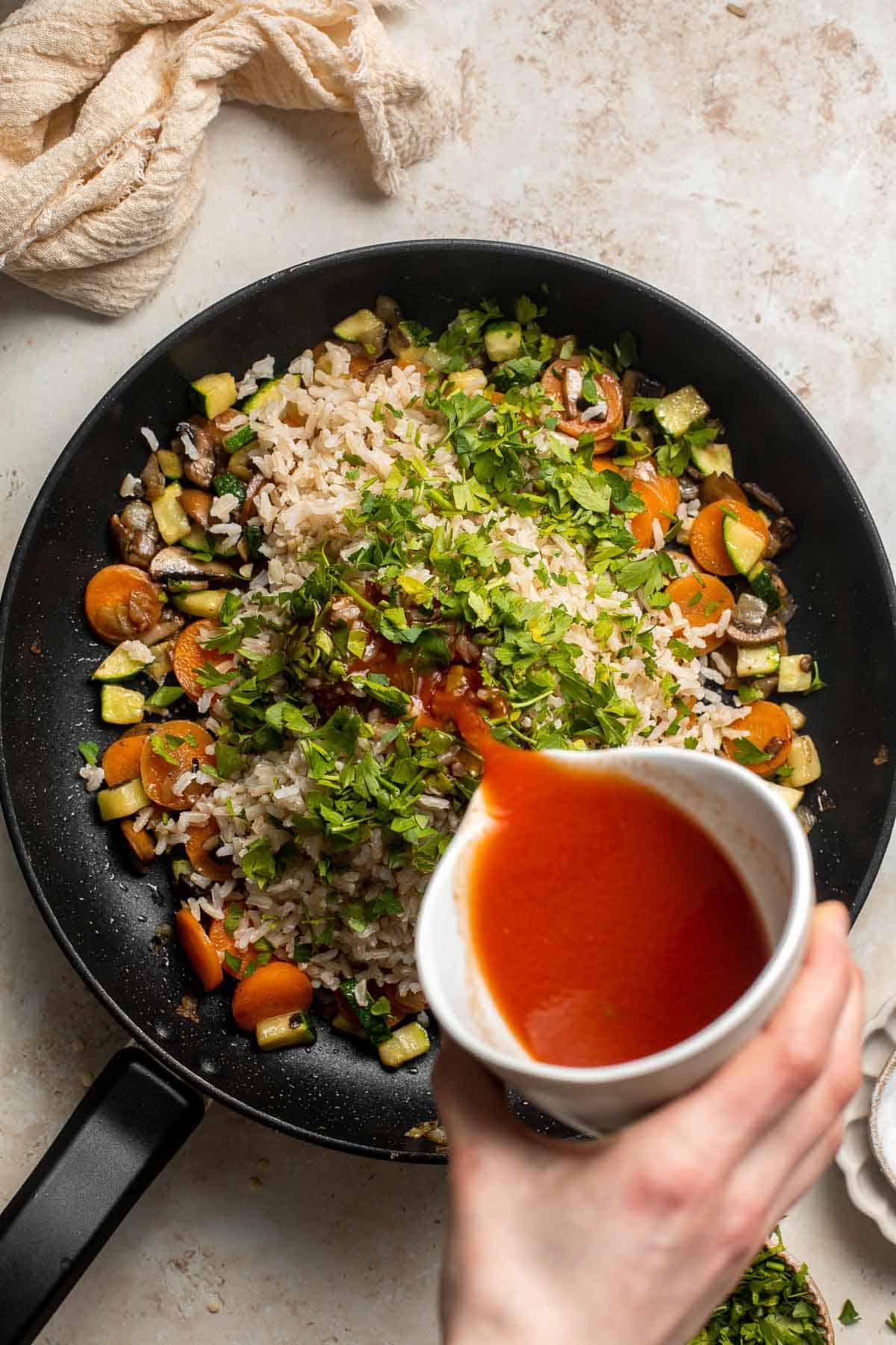 Vegan Stuffed Peppers are stuffed with pan-fried mushrooms, tender rice, and veggies, making them flavorful and filling. Easy to make in under an hour! | aheadofthyme.com