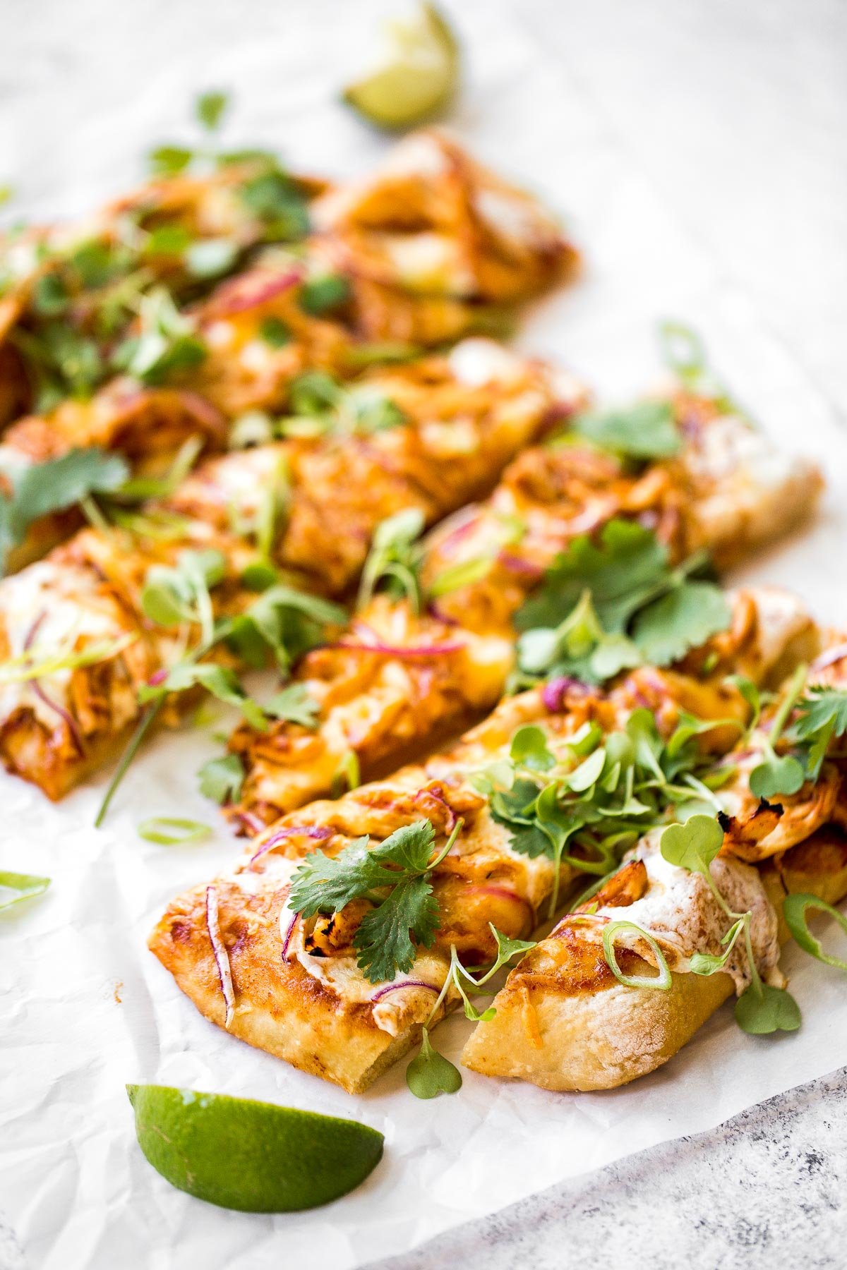 Forget delivery and make sweet, tangy, and smoky BBQ chicken pizza from the comfort of your own home in under 30 minutes. The easiest weeknight dinner. | aheadofthyme.com