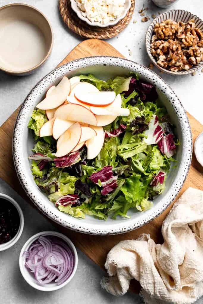 Delicious apple walnut salad with crisp apples, crunchy walnuts, and tangy balsamic vinaigrette. A healthy, easy side dish or lunch! | aheadofthyme.com