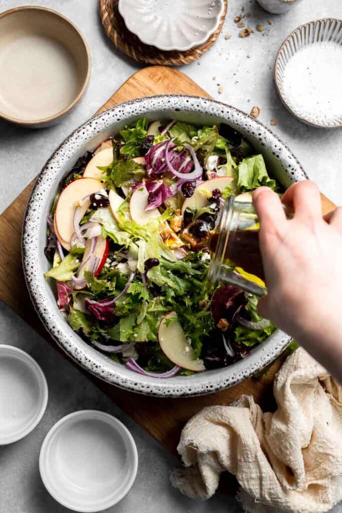 Delicious apple walnut salad with crisp apples, crunchy walnuts, and tangy balsamic vinaigrette. A healthy, easy side dish or lunch! | aheadofthyme.com