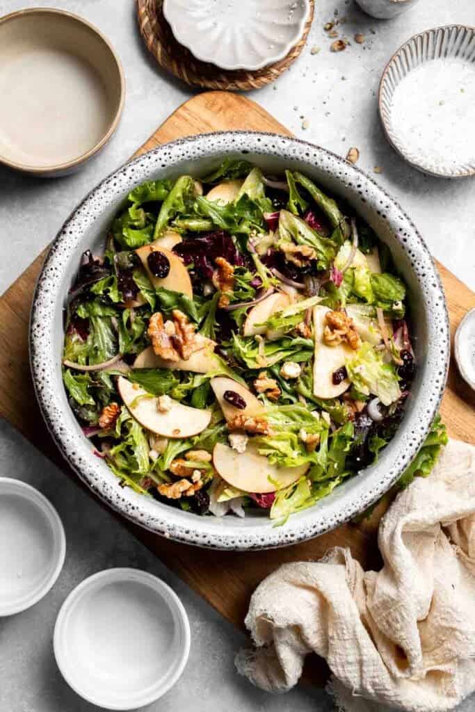 Delicious apple walnut salad with crisp apples, crunchy walnuts, and tangy balsamic vinaigrette. A healthy, easy side dish or lunch! | aheadofthyme.com
