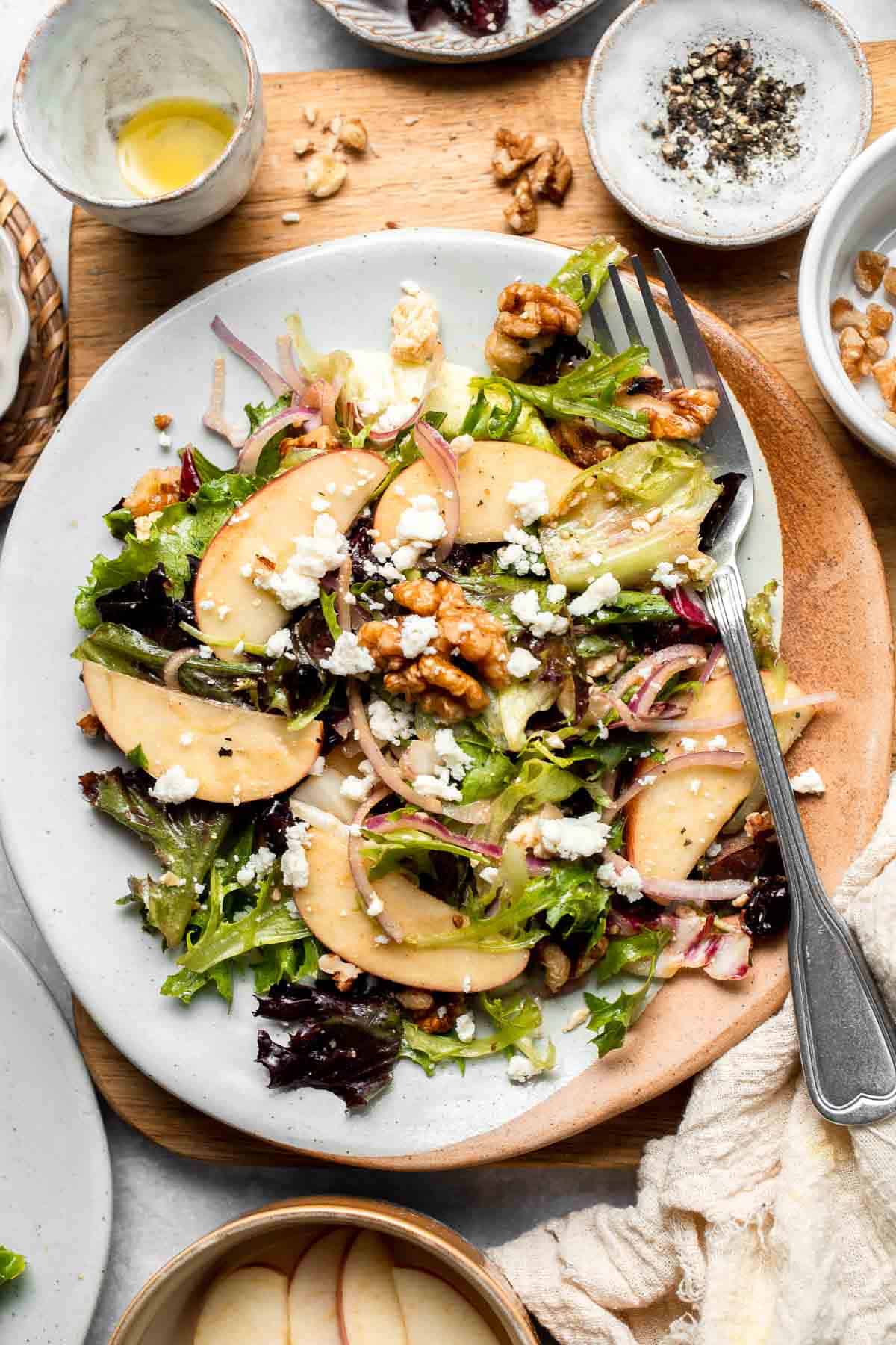 Delicious apple walnut salad with crisp apples, crunchy walnuts, and tangy balsamic vinaigrette. A healthy, easy side dish or lunch! | aheadofthyme.com