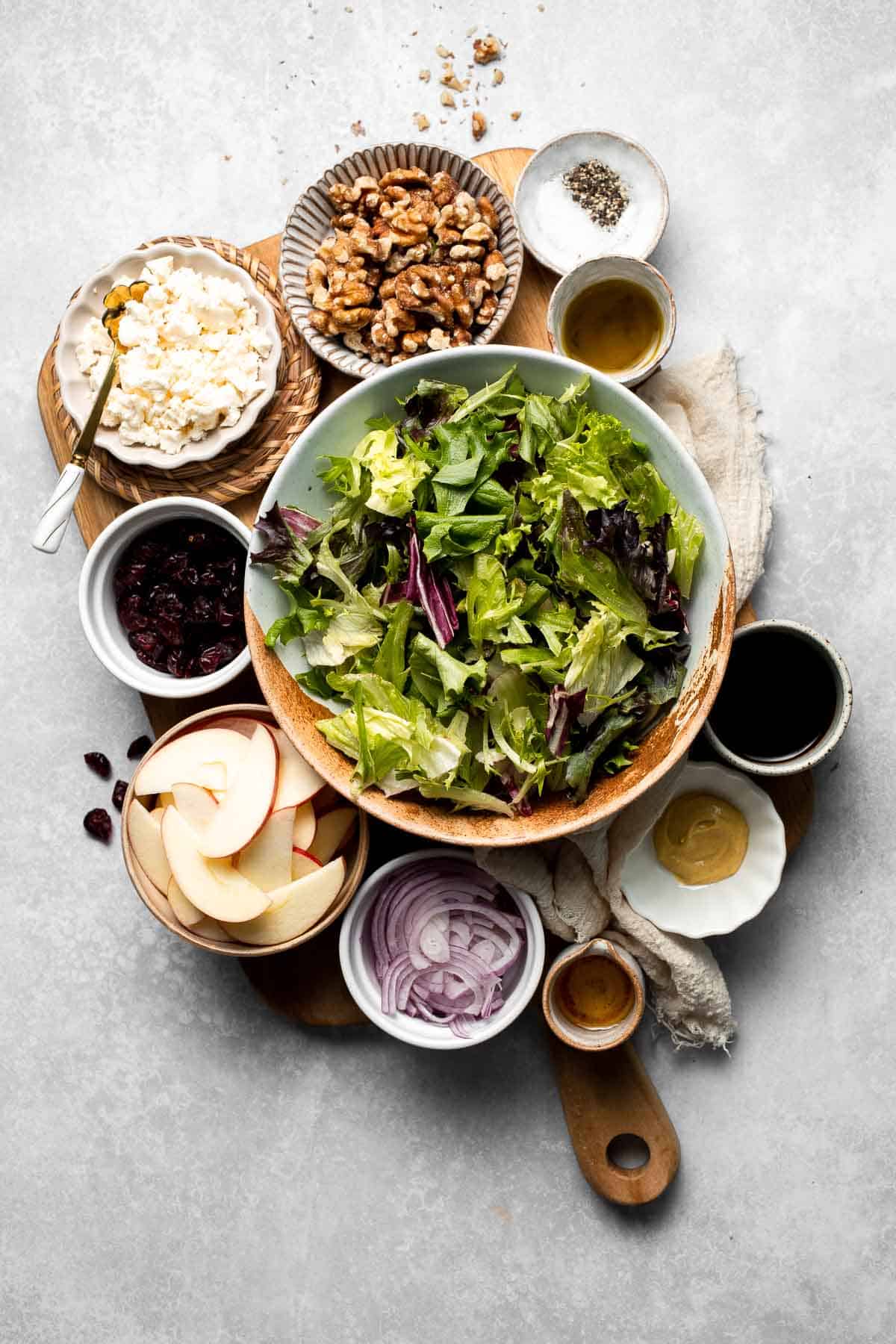 Delicious apple walnut salad with crisp apples, crunchy walnuts, and tangy balsamic vinaigrette. A healthy, easy side dish or lunch! | aheadofthyme.com