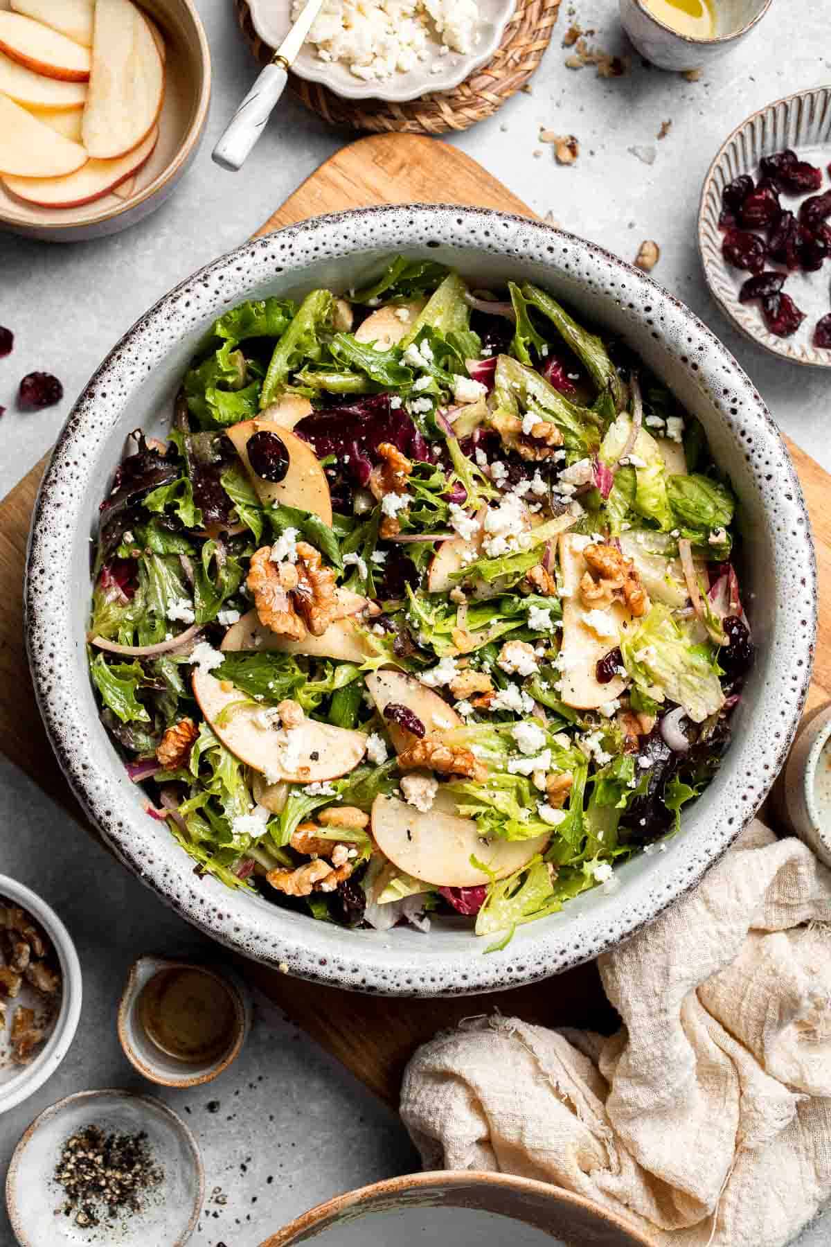 Delicious apple walnut salad with crisp apples, crunchy walnuts, and tangy balsamic vinaigrette. A healthy, easy side dish or lunch! | aheadofthyme.com