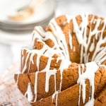 Celebrate fall this year with think and dense, yet surprisingly light, pumpkin pie bundt cake with cream cheese glaze. Can you think of a more perfect pair? | aheadofthyme.com