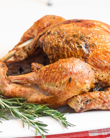 Make Thanksgiving easier with the best and juiciest roast turkey ever! It cooks faster and requires NO brining! | aheadofthyme.com
