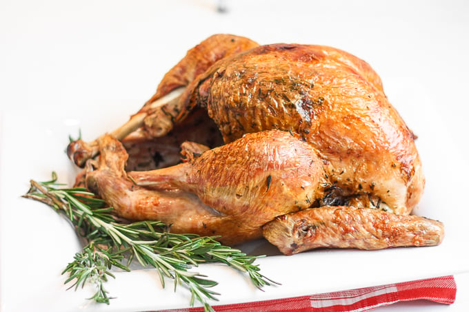 Make Thanksgiving easier with the best and juiciest roast turkey ever! It cooks faster and requires NO brining! | aheadofthyme.com