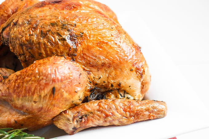 Make Thanksgiving easier with the best and juiciest roast turkey ever! It cooks faster and requires NO brining! | aheadofthyme.com