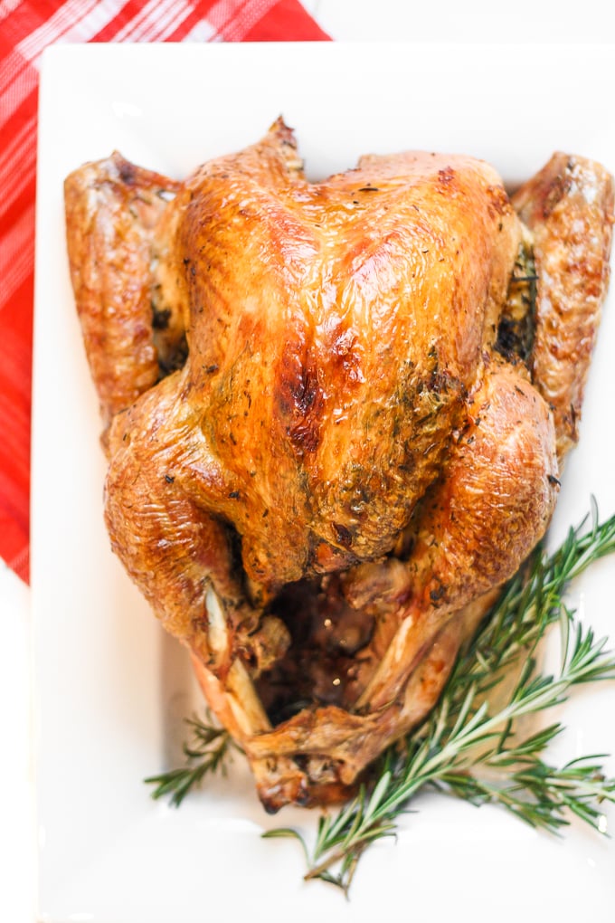 Make Thanksgiving easier with the best and juiciest roast turkey ever! It cooks faster and requires NO brining! | aheadofthyme.com