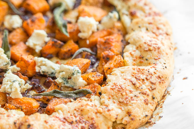 This butternut squash galette (free-form tart) is the perfect meal any time of day! Serve it with a fried egg for breakfast or alongside a big salad for lunch or dinner. | aheadofthyme.com