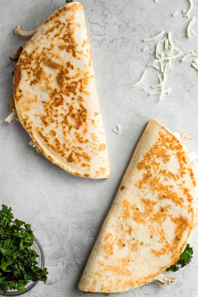 Quick and easy butternut squash quesadillas with chicken and kale is the best fall weeknight meal. It's flavourful, so cheesy, and has the perfect crunch. | aheadofthyme.com