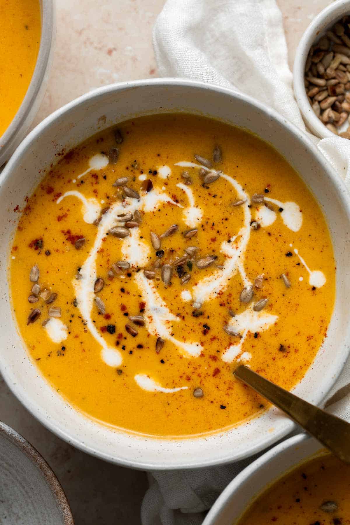 Carrot Pumpkin Soup is wholesome, nutritious, and delicious. It’s quick and easy comfort food that’s perfect to feed the family on lazy weeknights. | aheadofthyme.com