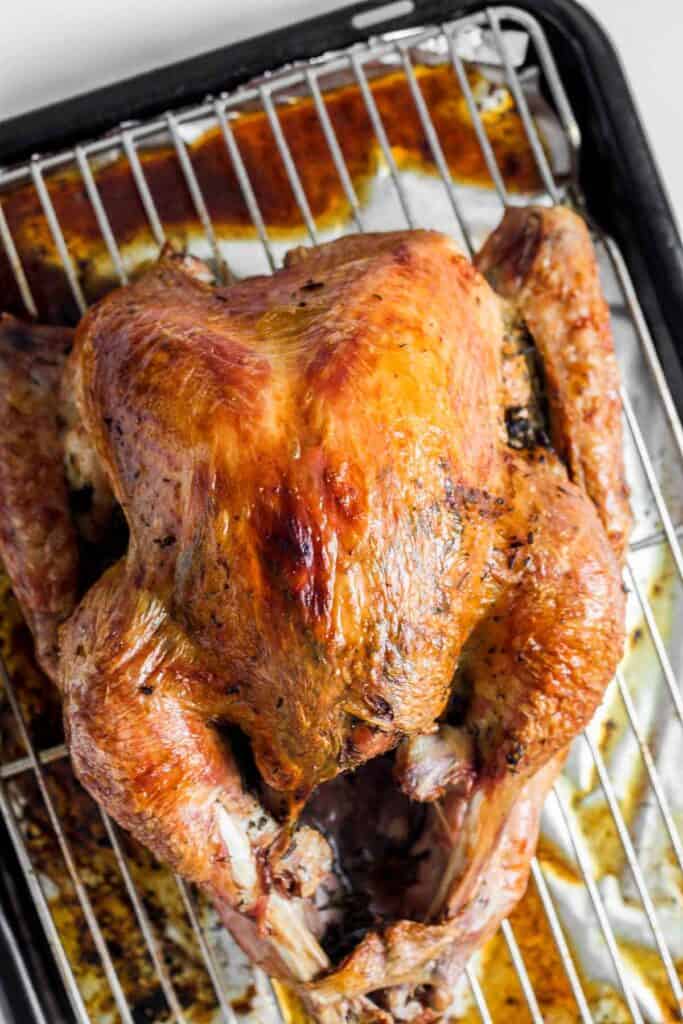 Make the best juicy roast turkey with this easy recipe! Learn how to roast a turkey perfectly golden, tender, and flavorful every time. | aheadofthyme.com