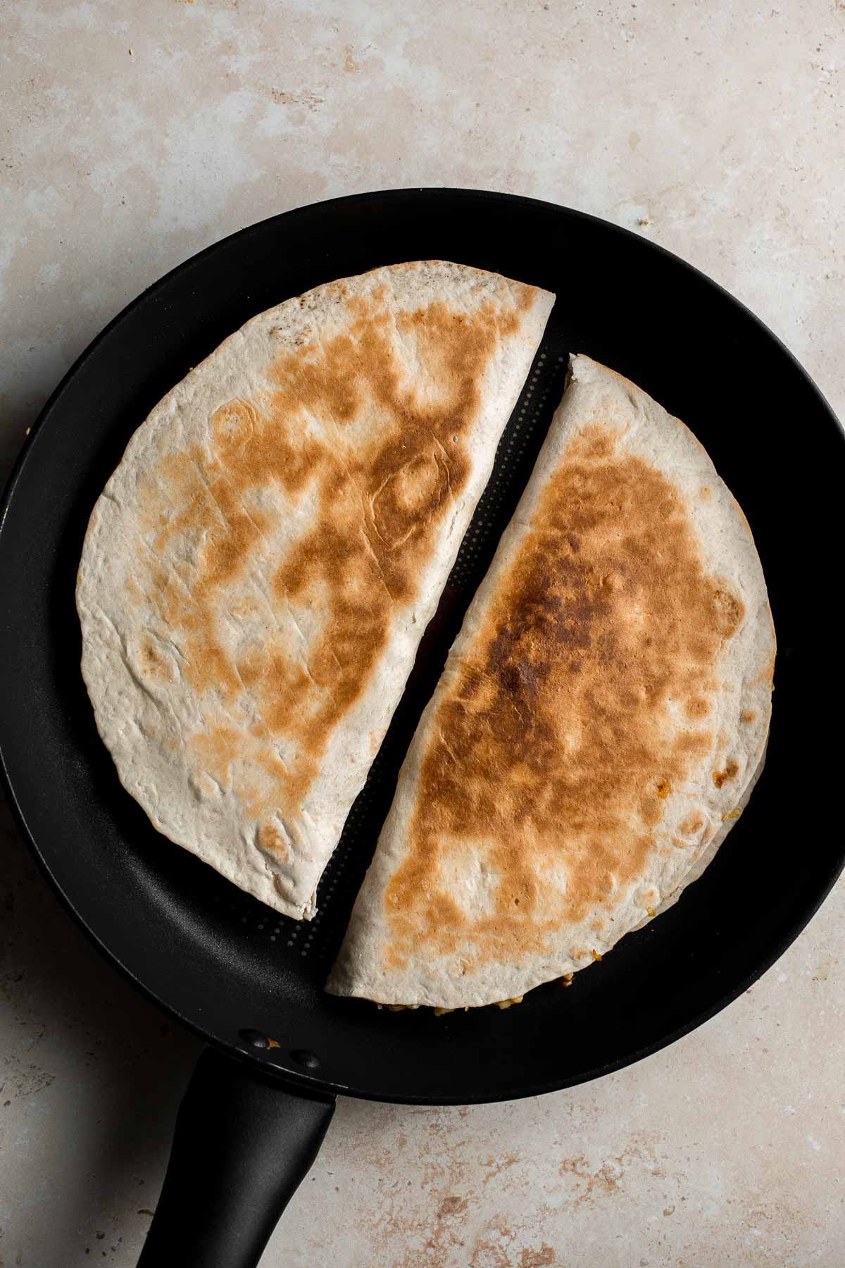 Vegetarian Breakfast Quesadillas are quick and easy to make, loaded with eggs and veggies, and flavorful. Perfect for meal prep and freezer-friendly too. | aheadofthyme.com