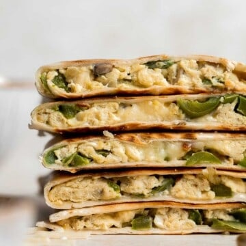 Vegetarian Breakfast Quesadillas are quick and easy to make, loaded with eggs and veggies, and flavorful. Perfect for meal prep and freezer-friendly too. | aheadofthyme.com