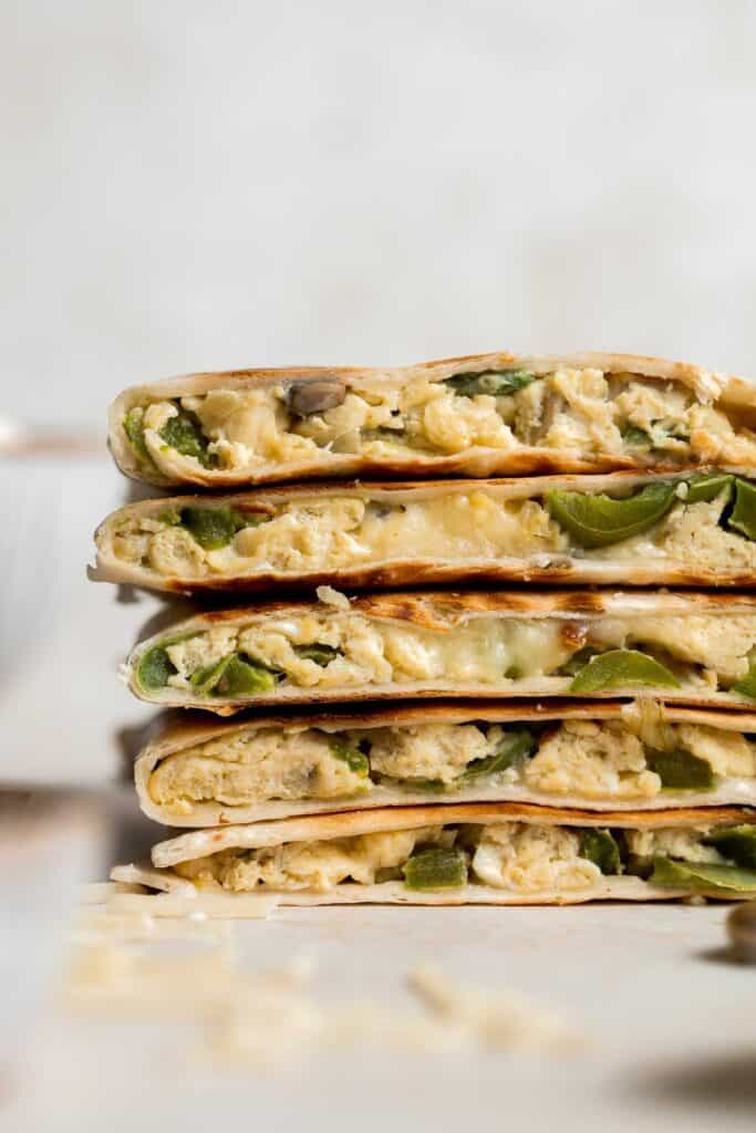 Vegetarian Breakfast Quesadillas are quick and easy to make, loaded with eggs and veggies, and flavorful. Perfect for meal prep and freezer-friendly too. | aheadofthyme.com
