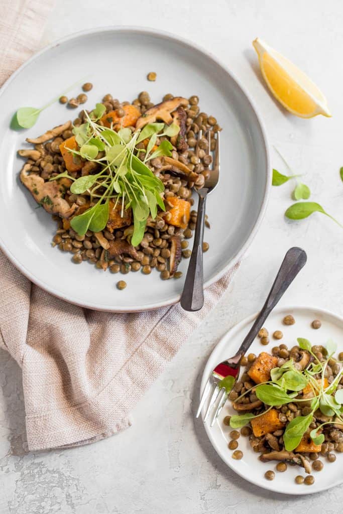 This warm lentil salad with butternut squash and shiitake mushrooms is the most comforting vegetarian main! Completely satisfying on its own or served with roasted chicken or salmon. | aheadofthyme.com