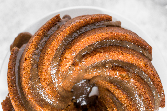 No one will be able to resist this perfectly sweet and moist, glazed brown sugar bundt cake. Made with Greek yogurt for major decadence and richness! | aheadofthyme.com