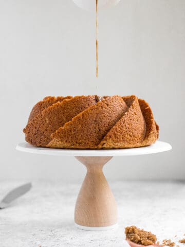 No one will be able to resist this perfectly sweet and moist, glazed brown sugar bundt cake. Made with Greek yogurt for major decadence and richness! | aheadofthyme.com