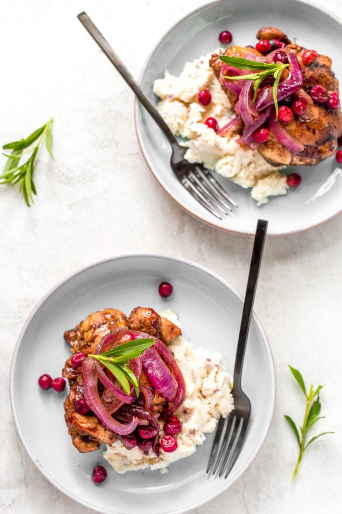 Roasted balsamic chicken with cranberries is a quick and easy 30-minute weeknight dinner made with tender chicken thighs in a sweet and tangy marinade. | aheadofthyme.com