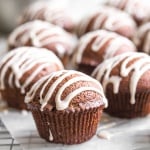 This fun twist on the classic takes hard, boring gingerbread and turns it into a delightful gingerbread muffins with vanilla bean glaze. Pure magic! | aheadofthyme.com