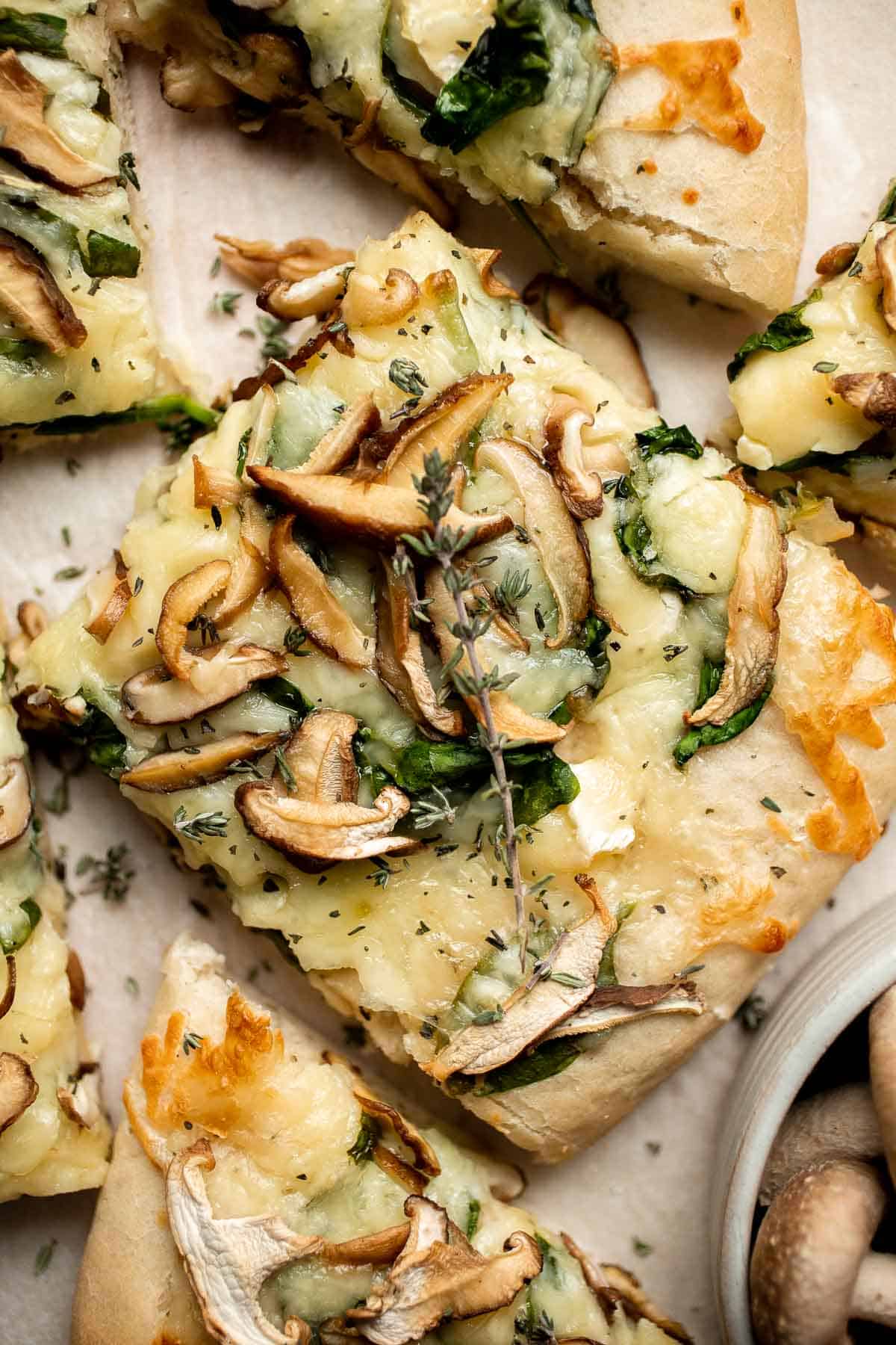 Mushroom Flatbread with Spinach made with homemade pizza dough, truffle Italian cheeses, and shiitake mushrooms, makes a perfect appetizer or simple dinner. | aheadofthyme.com