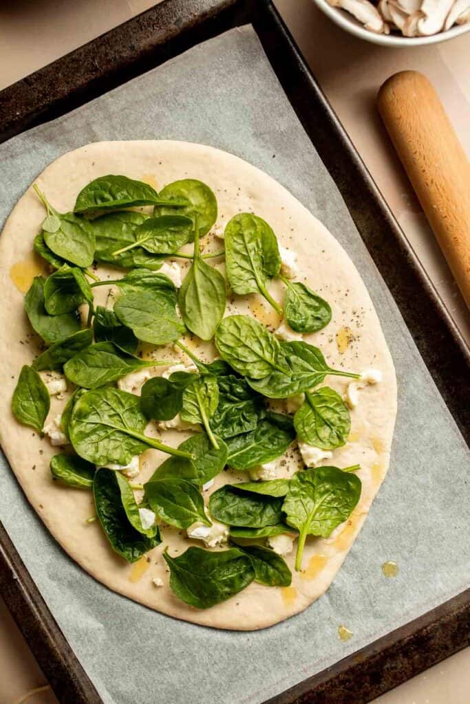 Mushroom Flatbread with Spinach made with homemade pizza dough, truffle Italian cheeses, and shiitake mushrooms, makes a perfect appetizer or simple dinner. | aheadofthyme.com