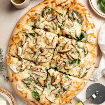 Mushroom Flatbread with Spinach made with homemade pizza dough, truffle Italian cheeses, and shiitake mushrooms, makes a perfect appetizer or simple dinner. | aheadofthyme.com