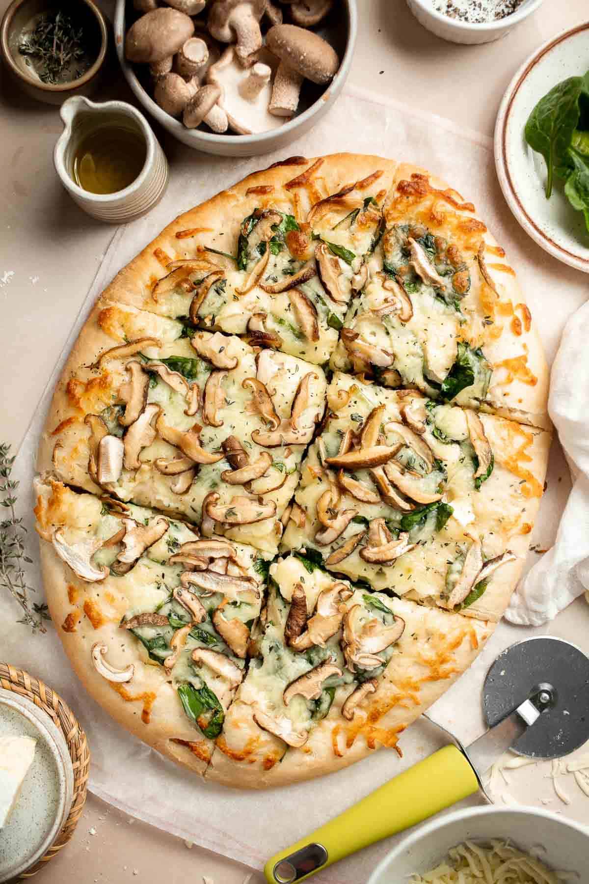 Mushroom Flatbread with Spinach made with homemade pizza dough, truffle Italian cheeses, and shiitake mushrooms, makes a perfect appetizer or simple dinner. | aheadofthyme.com