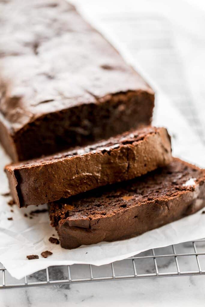 This fudgy double chocolate loaf cake is delicious, moist, and rich. It's easy to make with a quick one-bowl batter that's ready for the oven in 10 minutes. | aheadofthyme.com