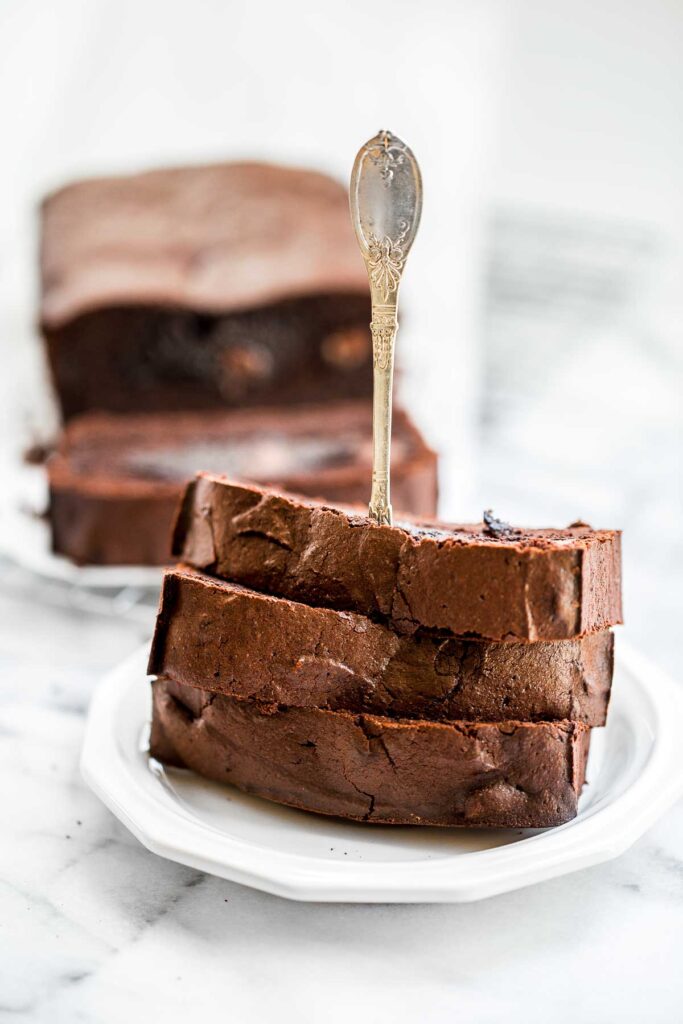 This fudgy double chocolate loaf cake is delicious, moist, and rich. It's easy to make with a quick one-bowl batter that's ready for the oven in 10 minutes. | aheadofthyme.com
