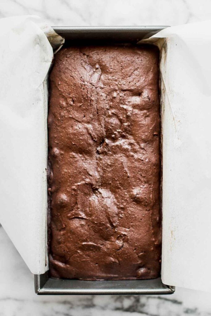 This fudgy double chocolate loaf cake is delicious, moist, and rich. It's easy to make with a quick one-bowl batter that's ready for the oven in 10 minutes. | aheadofthyme.com