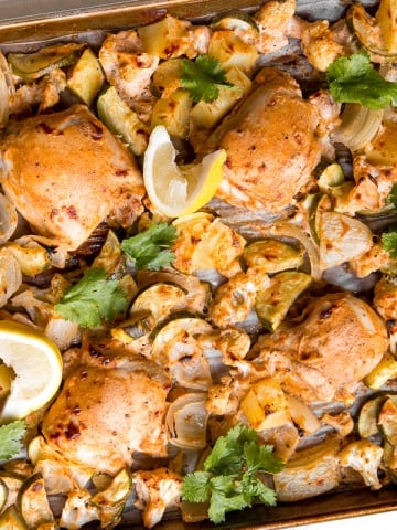 In under 30 minutes, create intensely flavourful tandoori chicken sheet pan dinner loaded with vegetables, any night of the week! Good-bye takeout! | aheadofthyme.com