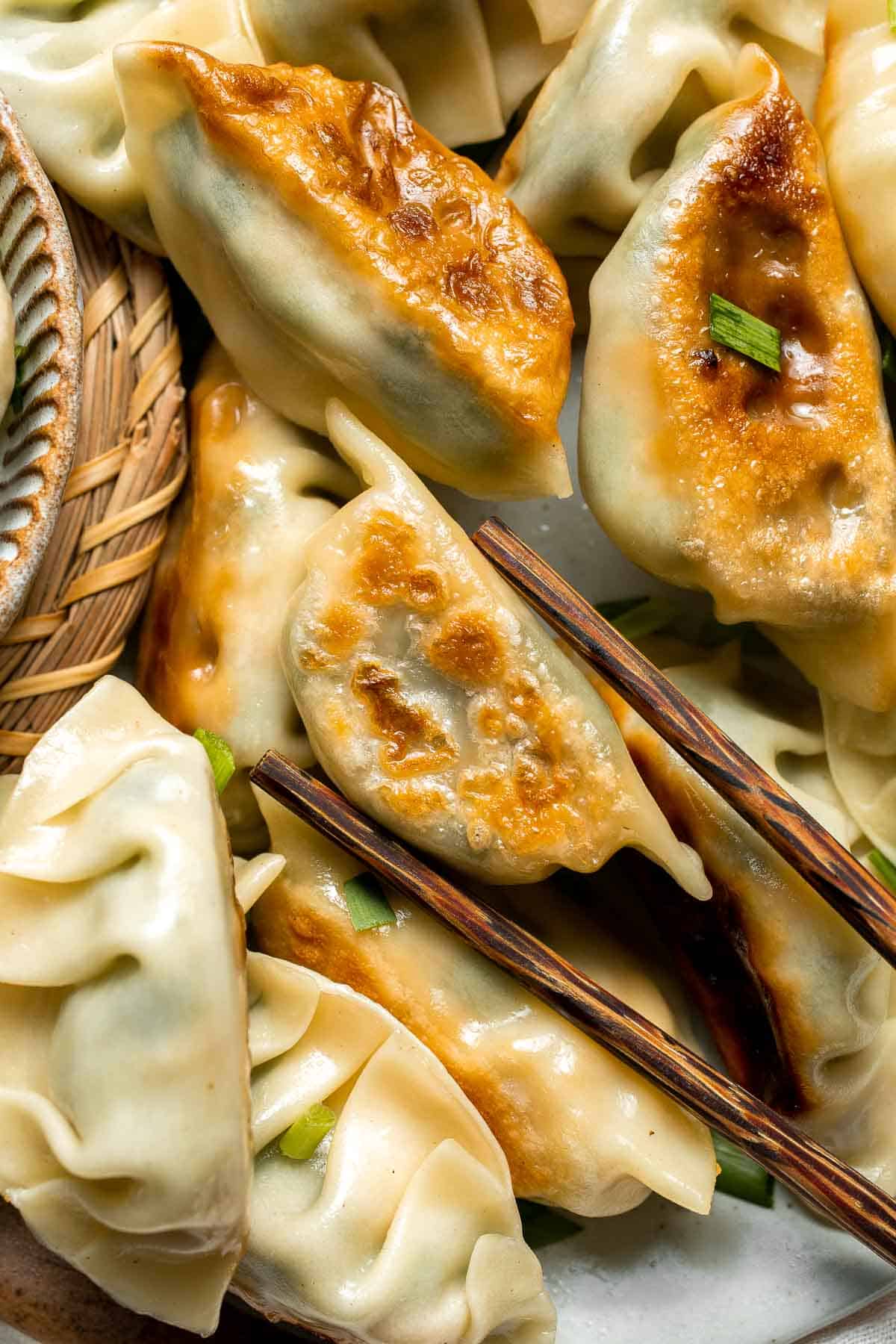Egg and Chive Vegetarian Dumplings are the perfect Chinese appetizers made with fragrant chives, fluffy scrambled eggs, and seasonings. | aheadofthyme.com