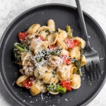 Orecchiette pasta with sausage, broccoli rabe, and roasted red peppers is a mix of spicy, sweet, and crunchy, and is on the table in less than 30 minutes! | aheadofthyme.com