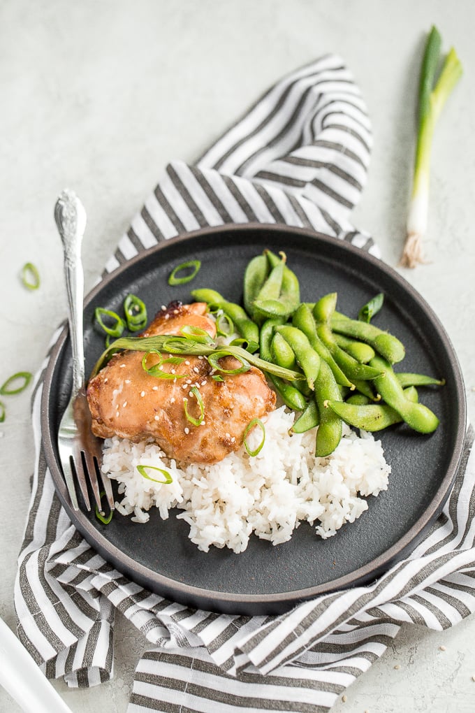 Sheet pan soy-glazed chicken thighs is the perfect weeknight meal -- 30 minutes in the marinade and 20 minutes in the oven. Easier and healthier than take-out! | aheadofthyme.com