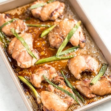 Sheet pan soy-glazed chicken thighs is the perfect weeknight meal -- 30 minutes in the marinade and 20 minutes in the oven. Easier and healthier than take-out! | aheadofthyme.com