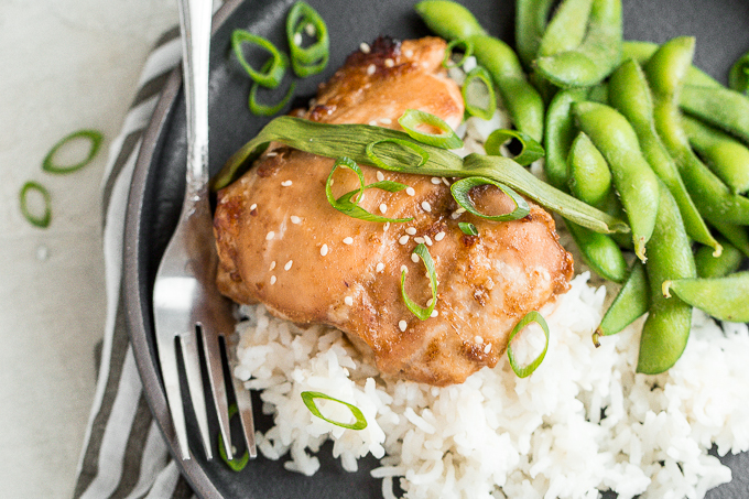 Sheet pan soy-glazed chicken thighs is the perfect weeknight meal -- 30 minutes in the marinade and 20 minutes in the oven. Easier and healthier than take-out! | aheadofthyme.com