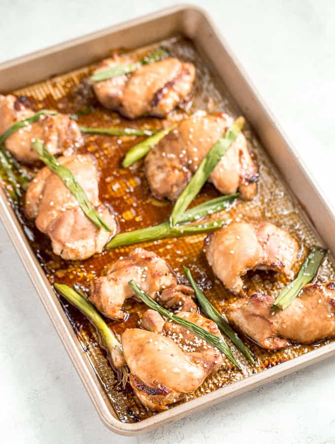 Sheet pan soy-glazed chicken thighs is the perfect weeknight meal -- 30 minutes in the marinade and 20 minutes in the oven. Easier and healthier than take-out! | aheadofthyme.com