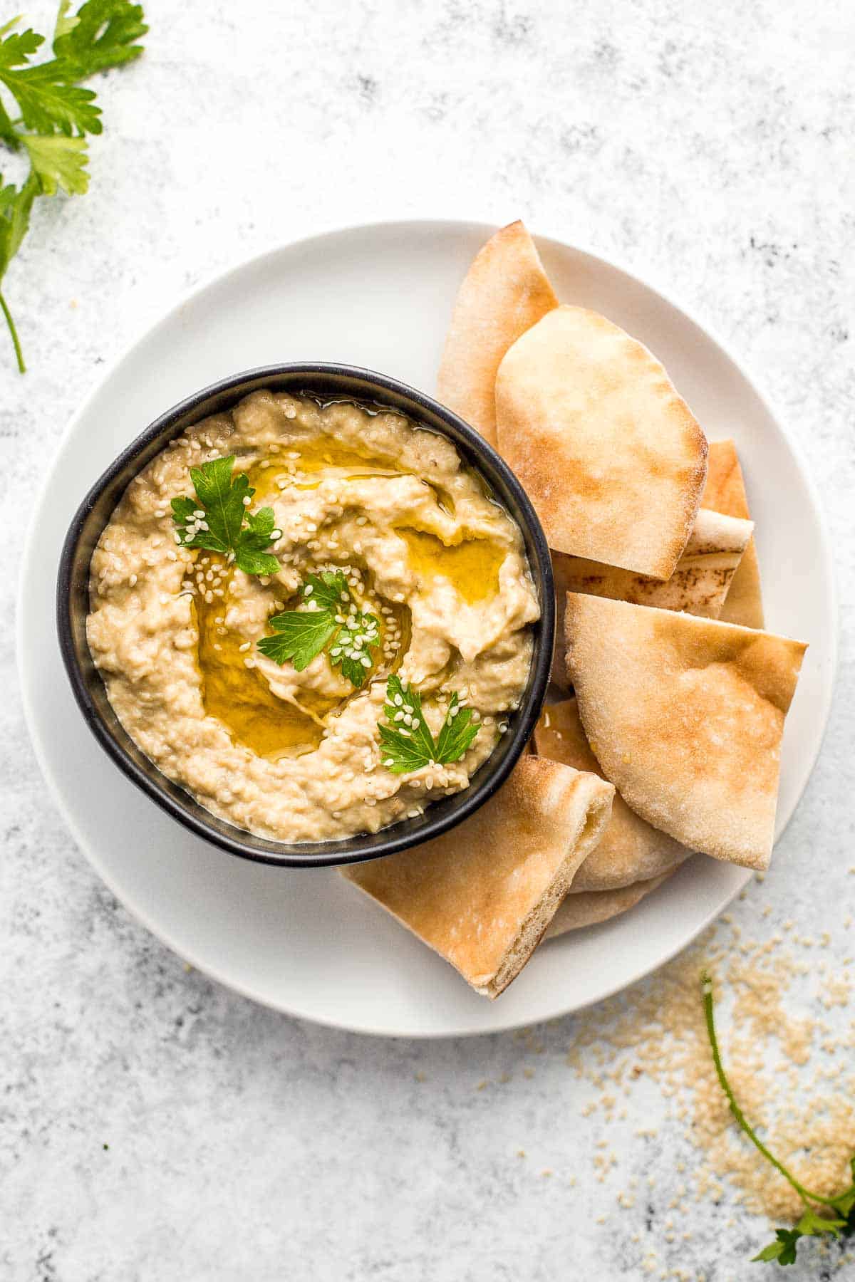 Baba ganoush eggplant dip is a delicious, flavorful, and vegan Mediterranean dip, loaded with roasted eggplants, olive oil, tahini, lemon, and garlic. | aheadofthyme.com