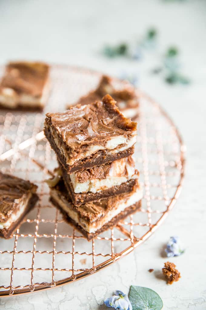 Caramel cheesecake brownies are totally indulgent and worth the effort, so toss that prepared brownie mix away and bake this with a few easy ingredients! | aheadofthyme.com