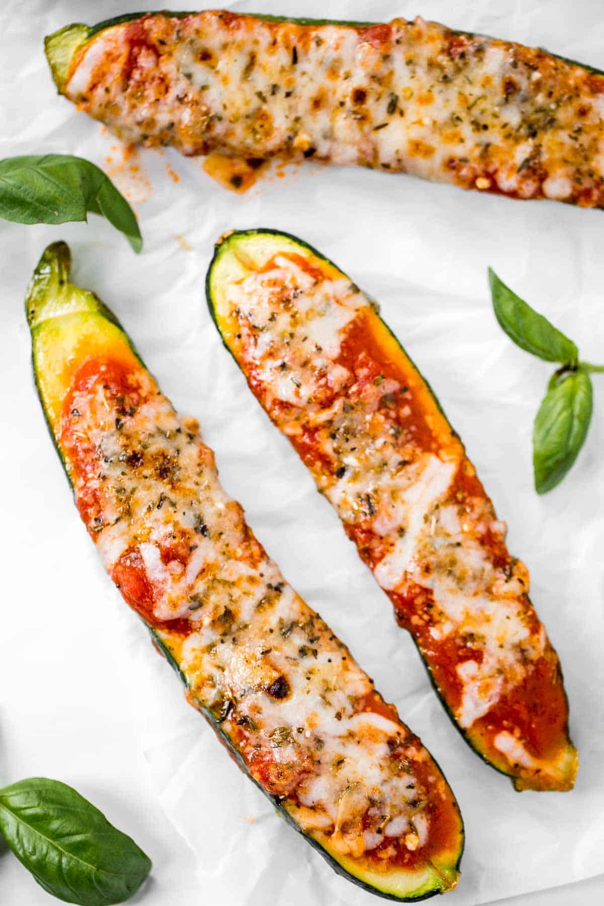 Cheesy Baked Zucchini with Marinara will save your weeknight dinner routine (and the kids love it too!). It's low carb, vegetarian, gluten-free, and keto. | aheadofthyme.com