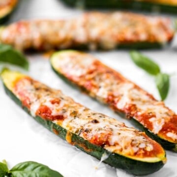 Cheesy Baked Zucchini with Marinara will save your weeknight dinner routine (and the kids love it too!). It's low carb, vegetarian, gluten-free, and keto. | aheadofthyme.com