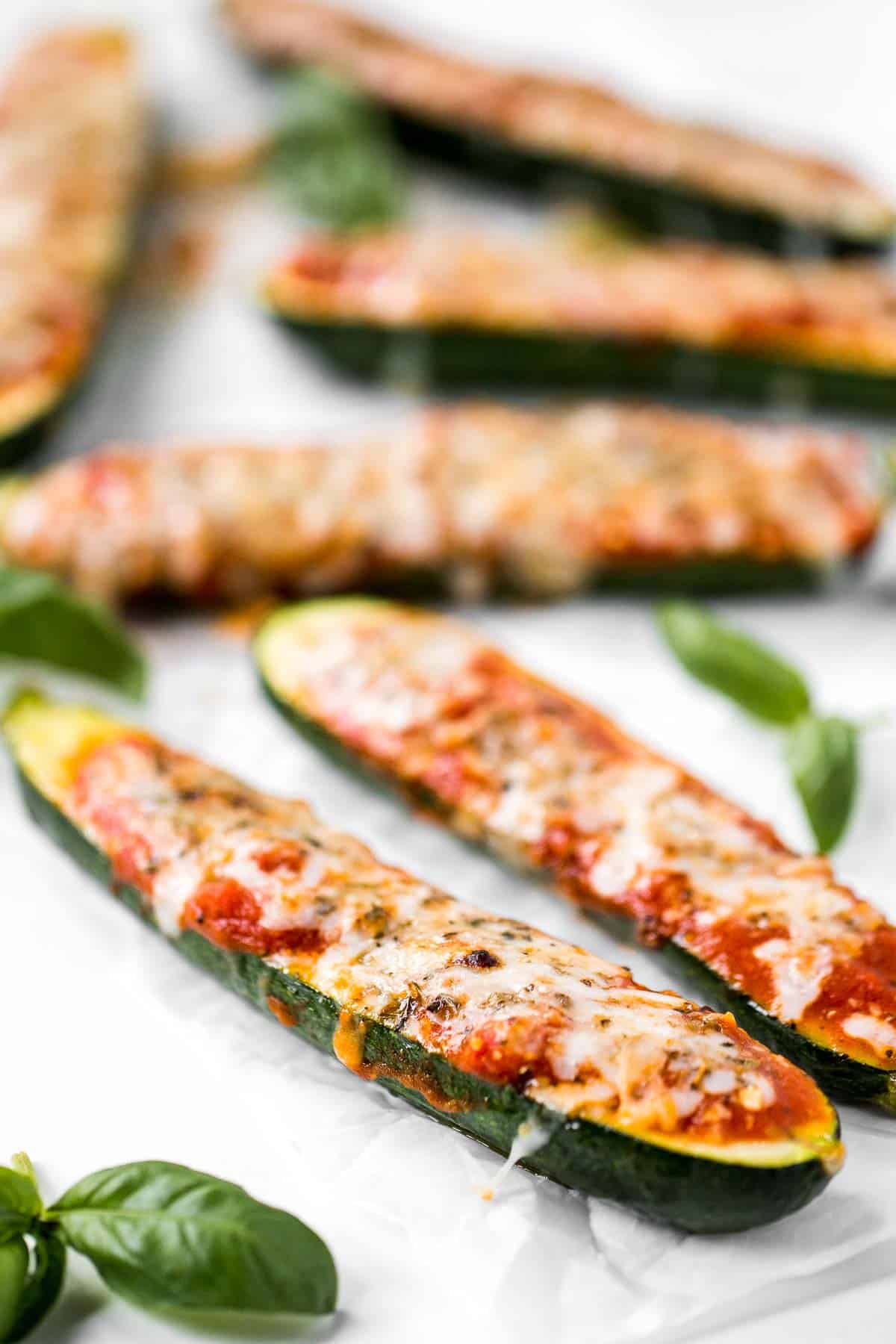 Cheesy Baked Zucchini with Marinara will save your weeknight dinner routine (and the kids love it too!). It's low carb, vegetarian, gluten-free, and keto. | aheadofthyme.com