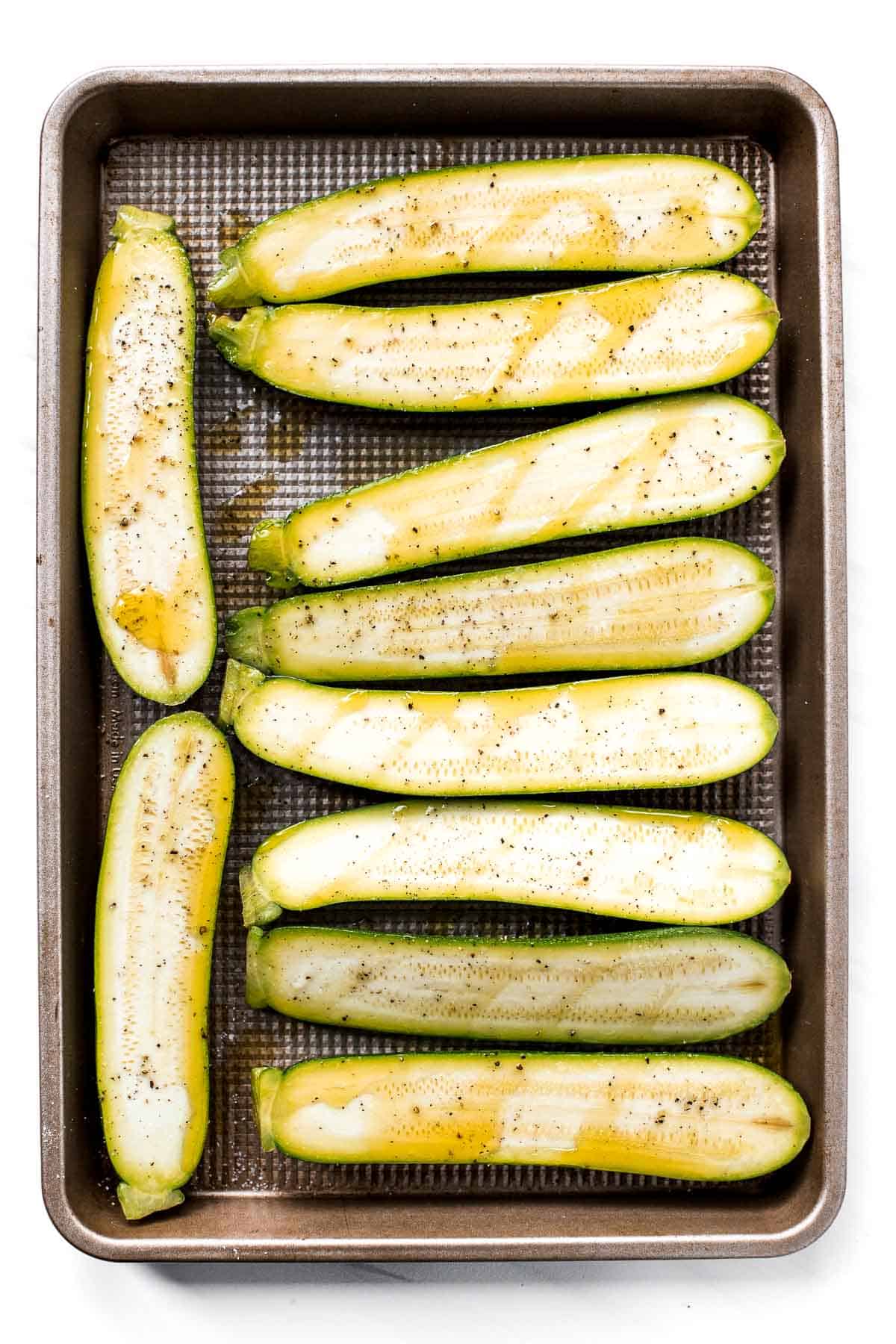 Cheesy Baked Zucchini with Marinara will save your weeknight dinner routine (and the kids love it too!). It's low carb, vegetarian, gluten-free, and keto. | aheadofthyme.com