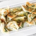 Fragrant chives with fluffy scrambled eggs, and a dash of flavour come together to create the perfect appetizer -- egg and chive vegetarian dumplings. | aheadofthyme.com