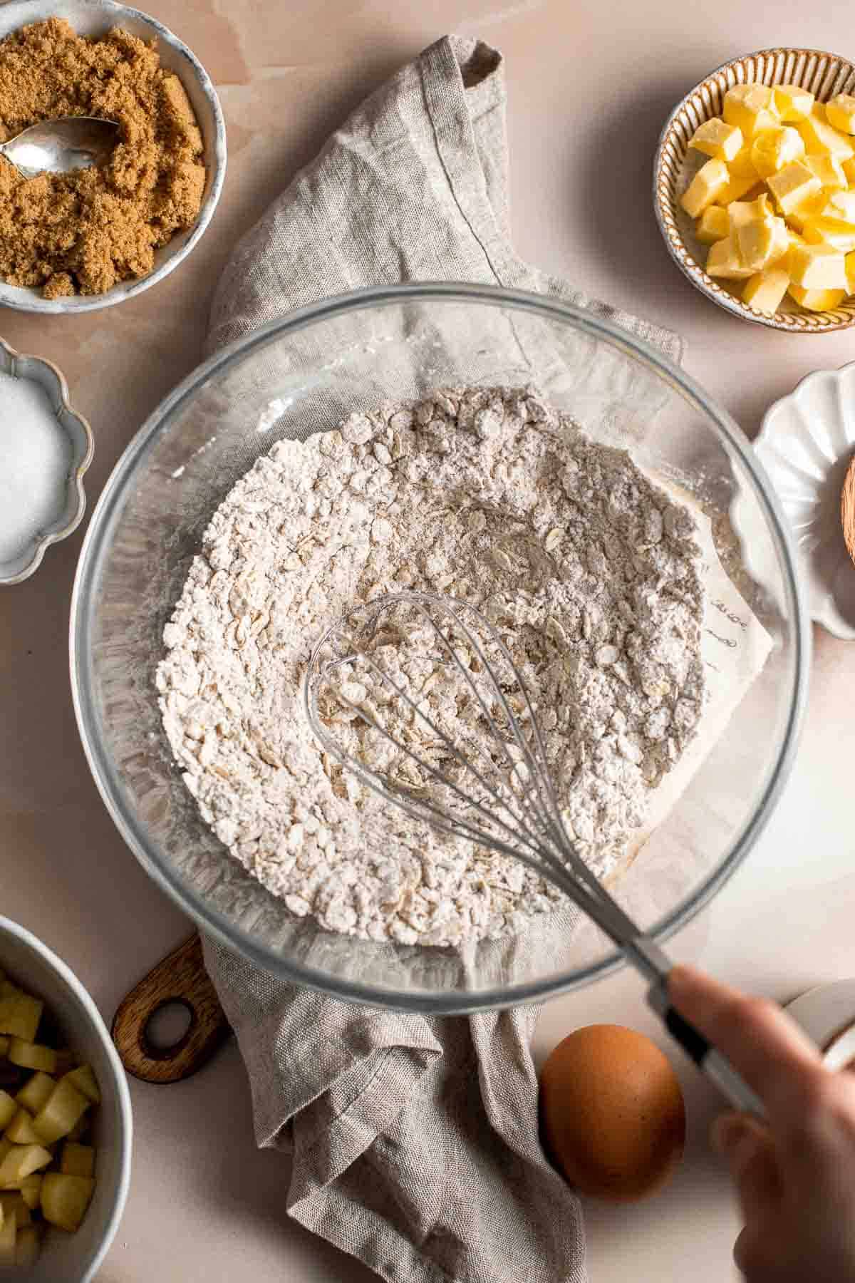 Cinnamon Apple Oatmeal Muffins are fast, easy and delicious— loaded with apples, oats, and fall spices. A quick nutritious bite for breakfast or snack time. | aheadofthyme.com