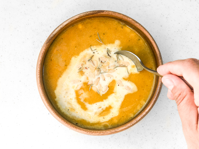 Bursting with fall flavours, creamy pumpkin and corn chowder is ready in under 30 minutes! It's the perfect vegetarian and gluten-free weeknight dinner. | aheadofthyme.com