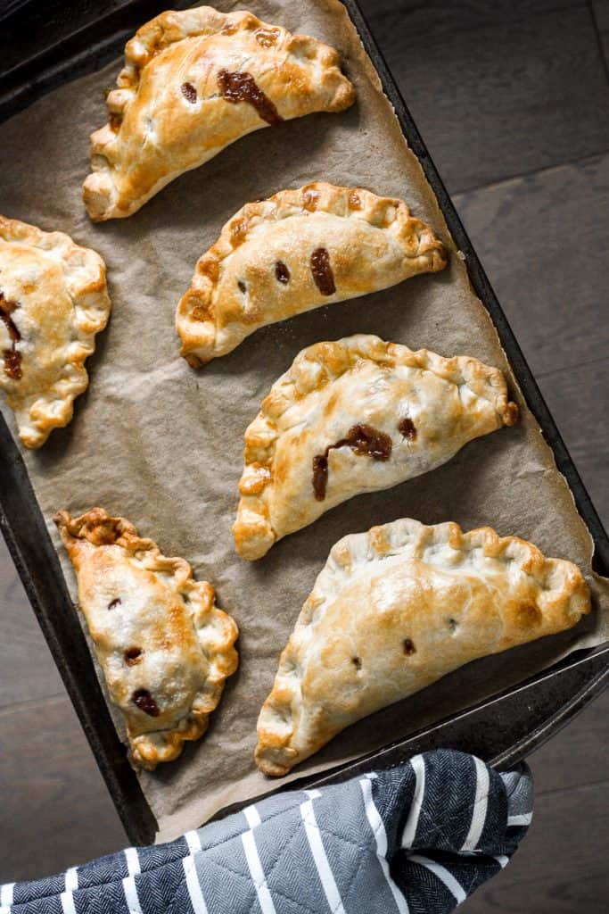 Easy homemade apple turnovers are the perfect fall treat -- stuffed with tender apples and cinnamon and wrapped in crispy, flakey, buttery crust. | aheadofthyme.com
