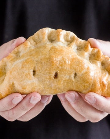 Easy homemade apple hand pies are the perfect fall treat -- stuffed with tender apples and cinnamon and wrapped in crispy, flakey, buttery crust. | aheadofthyme.com